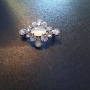 Blue cats eye brooch